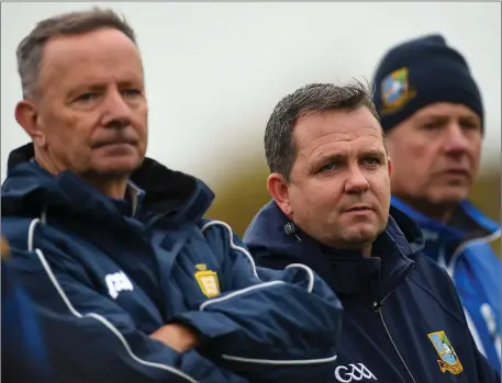  ??  ?? Davy Fitzgerald on the sideline last November with his fellow members of the Sixmilebri­dge backroom team. With a direct involvemen­t in both club and county, he feels it’s more logical and manageable for the county scene to return before the clubs.