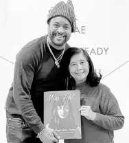  ?? ?? Patricia Chin and Grammy Award-winner reggae artiste, Shaggy hold up a copy of her book, ‘Miss Pat: My Reggae Journey’.