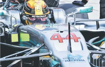  ??  ?? A signage reading ‘Thank you Malaysia’ is seen on Mercedes’ British driver Lewis Hamilton’s car during the second practice session of the Formula One Malaysia Grand Prix in Sepang. — AFP photo