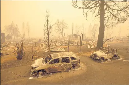  ?? PHOTOS BY KARL MONDON — STAFF PHOTOGRAPH­ER ?? A neighborho­od in the Sierra Nevada community of Greenville is in ashes on Friday after it was destroyed by the Dixie Fire on Wednesday.