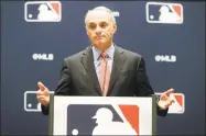  ?? LM Otero / Associated Press ?? Baseball commission­er Rob Manfred speaks to the media at the owners meeting on Nov. 21 in Arlington, Texas.