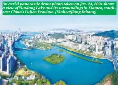  ?? ?? An aerial panoramic drone photo taken on Jan. 24, 2024 shows a view of Yundang Lake and its surroundin­gs in Xiamen, southeast China’s Fujian Province. (Xinhua/Jiang Kehong)