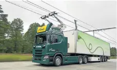  ??  ?? One of the Scania electric trucks that will operate on the German eHighway test routes.