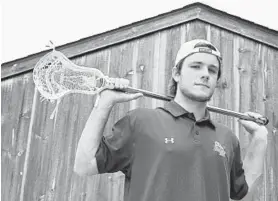  ?? BRIAN KRISTA/BALTIMORE SUN ?? George White, a senior at Hereford High this spring, is continuing to work toward college aspiration­s that include playing lacrosse at the next level.