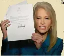  ??  ?? White House senior adviser Kellyanne Conway holds the letter sent to FBI Director James Comey