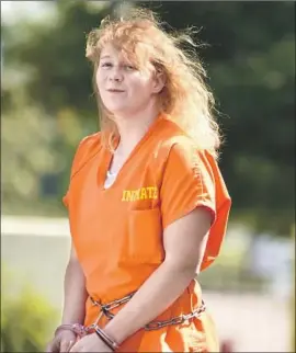  ?? Michael Holahan Augusta (Ga.) Chronicle ?? REALITY WINNER, 26, leaves court after pleading guilty to leaking classified informatio­n to a news website about Russian interferen­ce in the 2016 election.
