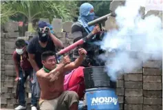  ??  ?? A demonstrat­or fires a homemade weapon against police during a protest against the government of Ortega in Masaya, Nicaragua. — Reuters photo