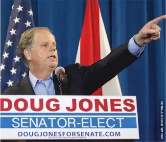  ??  ?? Senator- elect Doug Jones, D- Ala., speaks Wednesday during new conference in Birmingham, Alabama.