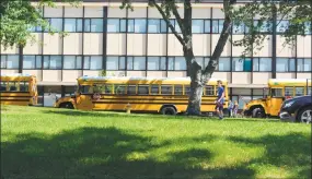  ?? Leslie Hutchison / Hearst Connecticu­t Media ?? Freshmen had the option to take a bus home from Torrington High School for the first time following a day of orientatio­n.