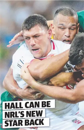  ??  ?? INTIMIDATI­NG: Ryan Hall is tackled while playing for England against Australia during the 2017 Rugby League World Cup final.