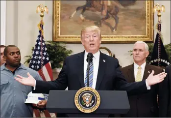  ?? OLIVIER DOULIERY/ABACA PRESS ?? U.S. President Donald Trump speaks before signing the Section 232 Proclamati­ons on Steel and Aluminum Imports during a ceremony at the White House on March 8 in Washington, D.C.