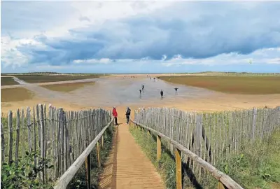  ?? Picture: EAMONN MCCABE/GALLO/GETTY ?? BUMMER: The footpath to the beach at Holkham, where ‘internet perverts’ are spoiling everyone’s good, clean fun