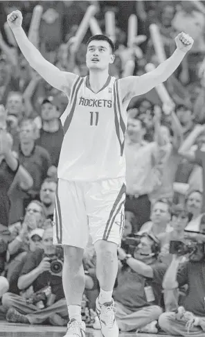  ?? Brett Coomer / Houston Chronicle file ?? Rockets center Yao Ming celebrates during the fourth quarter in Game 6 of the 2009 NBA Western Conference first round playoffs against the Portland Trail Blazers. The Rockets won the game 92-76 to win the series.