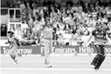  ??  ?? India’s Jhulan Goswami (C) celebrates after taking the wicket of England’s Natalie Sciver during the ICC Women’s World Cup cricket final between England and India at Lord’s cricket ground in London on July 23, 2017.- AFP photo