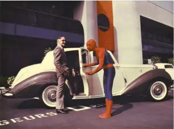  ??  ?? Stan Lee and a Marvel employee in the Marvel Production­s parking lot, Los Angeles, early 1980s
