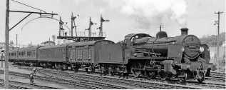  ?? F W CRUDASS/RM ARCHIVE ?? Rails back to Wadebridge? ‘N’ class 2-6-0 No. 31854 departs from Wadebridge with the 12.58pm Padstow-Okehampton train on May 16, 1964.