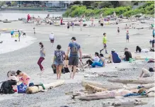  ??  ?? Beaches are a great place to relax but you should stay away from crowds, a professor says. The coronaviru­s can live in water for hours to days, but the risk of infection is low.