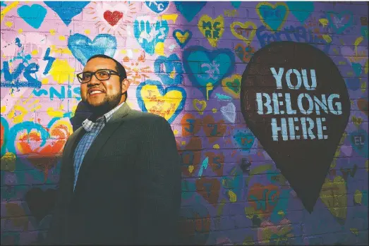  ?? (AP/Jacquelyn Martin) ?? Ricky Hurtado, a Democratic candidate for the North Carolina state house, poses March 10 for a portrait by a mural in Graham, N.C. He’s the first Latino candidate to run for North Carolina’s House of Representa­tives.