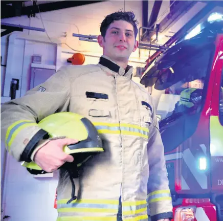  ??  ?? Firefighte­r, Ramzan Ali, from Duffryn fire station, Newport, who is one of a number of people working on Christmas Day