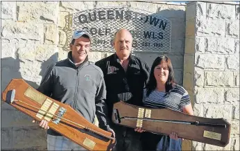  ??  ?? PROUD CHAMPS: Winners of the Integrity Insurance closed championsh­ips were, from left, Jared Scharneck and Elaine Walker with Cor Oosthuizen from the Queenstown Golf Club in the middle