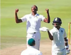  ?? AFP ?? South African fast bowler Kagiso Rabada celebrates the dismissal of Hardik Pandya (centre).