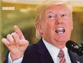  ?? REUTERS PIC ?? US President Donald Trump fielding questions on the Charlottes­ville ‘Unite The Right’ rally at Trump Tower in Manhattan on Tuesday.