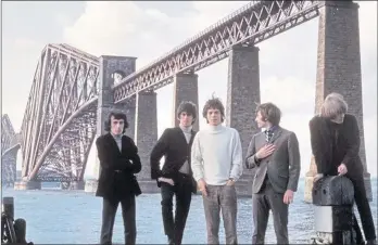  ??  ?? The Rolling Stones visit the Forth Bridge, opened 130 years ago this week, in 1964