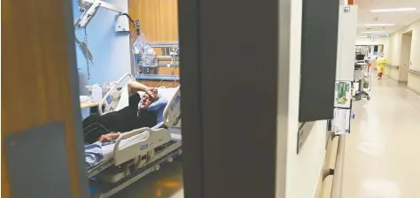  ?? NATHAN DENETTE / THE CANADIAN PRESS ?? COVID-19 patient Jose Garcia, 67, receives oxygen in the respirolog­y unit at the Humber River Hospital in Toronto earlier this year.