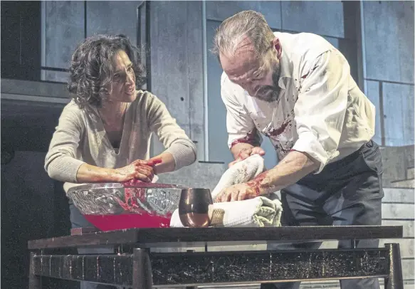  ?? PICTURE: MATT HUMPHREY ?? Ralph Fiennes and Indira Varma as Lord and Lady Macbeth in the current producucti­on of the ‘Scottish Play’ at the Royal Highland Centre on the outskirts of Edinburgh