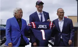  ??  ?? ▲ Former Alabama quarterbac­k Mac Jones, center, poses with team owner Robert Kraft, left, and team president Jonathan Kraft after his selection by the New England Patriots. Photograph: Charles Krupa/AP