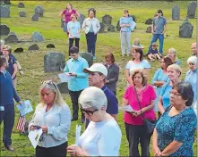  ?? CLAIRE BESSETTE THE DAY ?? About 40 people gathered Thursday at the historic Norwichtow­n colonial burying ground for a rally in opposition to a proposed Burger King at nearby 61, 63 and 65 Town St. in Norwich.