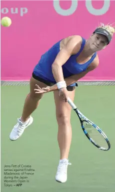  ?? — AFP ?? Jena Fett of Croatia serves against Kristina Mladenovic of France during the Japan Women’s Open in Tokyo.