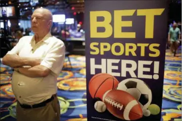  ?? SETH WENIG — THE ASSOCIATED PRESS FILE ?? A sign advertisin­g sports betting is displayed at Ocean Resort Casino in Atlantic City, N.J., in June.