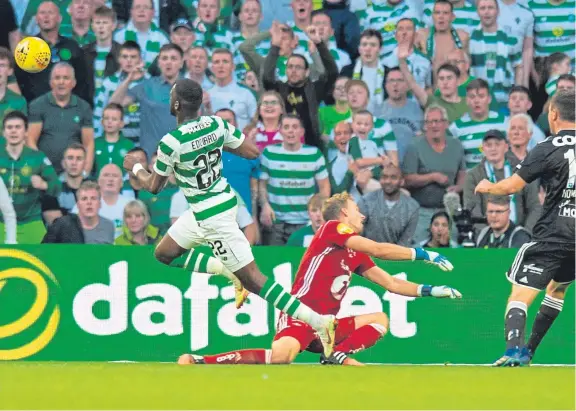  ?? Pictures: SNS Group. ?? Breathing space: Odsonne Edouard makes it 3-1 to the Hoops at Celtic Park.