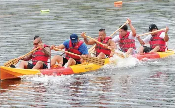  ?? Ernest A. Brown photo ?? Dragonboat races kept spectators and contestant­s busy during the annual Southeast Asian Waterfront Festival at Cold Spring Park in Woonsocket Saturday. The fun continues with even more races today.