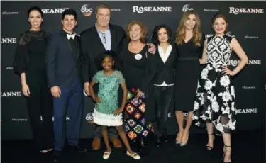  ?? PHOTO BY JORDAN STRAUSS — INVISION — AP, FILE ?? In this file photo, from left, Whitney Cummings, Michael Fishman, John Goodman, Jayden Rey, Roseanne Barr, Sara Gilbert, Sarah Chalke and Emma Kenney arrive at the Los Angeles premiere of “Roseanne” in Burbank.