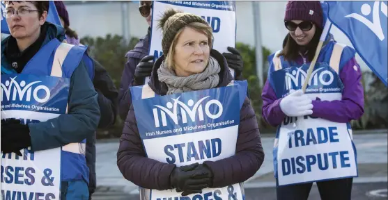  ??  ?? Nurses – not those quoted on this page – on strike outside Bray Health Centre last Thursday.