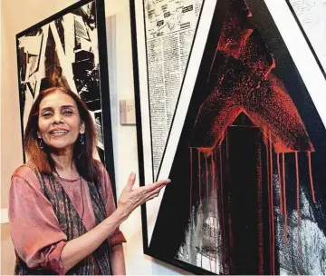  ??  ?? Nirmala presenting her work Great Leap Forward VI - Bakun at the launch of her The Making Of An
exhibition at Valentine Willie Fine Art in Kuala Lumpur in 1998. — Photos: Filepic