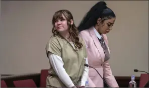  ?? (AP/The Albuquerqu­e Journal /Eddie Moore) ?? Hannah Gutierrez Reed (left) and paralegal Carmella Sisneros await sentencing in state district court in Santa Fe, N.M., on Monday.