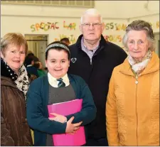  ?? Photo by Michelle Cooper Galvin. ?? Ali Ryan with her grandparen­ts – Mary McCarthy, and Eddie and Kathleen Ryan – enjoying the Grandparen­ts Day in Nagle Rice Primary School, Milltown.