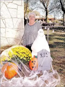  ?? RACHEL DICKERSON/MCDONALD COUNTY PRESS ?? Becky Davis of Pineville is pictured with her Halloween decoration­s. She loves Halloween and always has hundreds of trick-or-treaters.