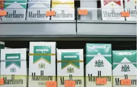  ?? JOE RAEDLE/GETTY IMAGES FILE ?? The White House has delayed enacting a ban on menthol and flavored tobacco products, against the wishes of the Food and Drug Administra­tion.