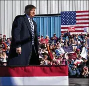  ?? DOUG MILLS / THE NEW YORK TIMES ?? President Donald Trump takes the stage Saturday for a campaign rally at Elko, Nev. The president said he will pull the United States out of a 31-year-old nuclear missile treaty with Russia.