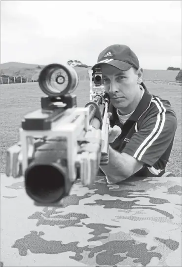  ?? Photo: HINERANGI VAIMOSO ?? On the mark: Paralympic gold medallist Michael Johnson and Mt Eden’s Auckland Parafed Shooting Club are resurrecti­ng the sport of air rifle shooting.