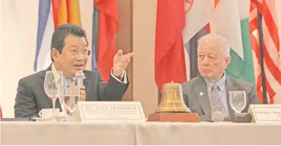  ?? PHOTOGRAPH BY JOEY SANCHEZ MENDOZA FOR THE DAILY TRIBUNE @tribunephl_joey ?? H.E. Tull Traisorat, the Kingdom of Thailand’s Ambassador to the Philippine­s, sits beside Rotary Club of Manila president Rafael Alunan III as he answers questions from Rotarians after he delivered his speech during the Club’s 28th weekly meeting at the Manila Polo Club in Makati last week.