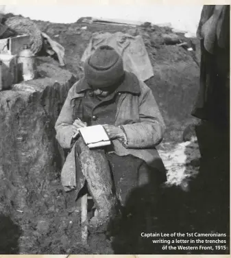  ??  ?? Captain Lee of the 1st Cameronian­s writing a letter in the trenches
of the Western Front, 1915