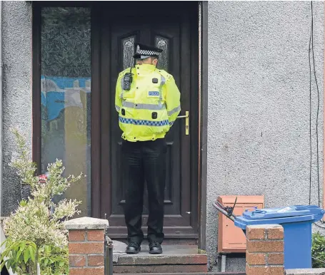  ?? George Mcluskie. Picture: ?? Police stand guard at a property in Barnton Place, Glenrothes, as the hunt for Allan Bryant Jr continues.