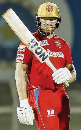  ?? — IPL ?? Jonny Bairstow of Punjab Kings celebrates his half century against Royal Challenger­s Bangalore during their Indian Premier League match at the Brabourne Stadium in Mumbai on Friday.