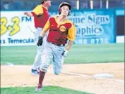  ?? Shotgun Spratling
Los Angeles Times ?? GARRETT STUBBS races around third to score the winning run for USC against San Diego State.