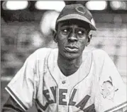  ?? GEORGE BRACE/FILE ?? By the time Negro League legend Satchel Paige reached the major leagues, he was past his prime, but his baseball career spanned parts of five decades, and it included a ceremonial stint with the Braves.